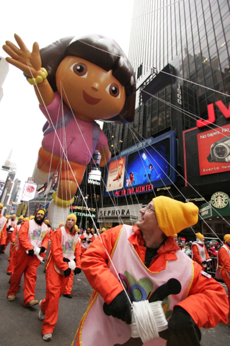 galleries/2011/11/24/macy-s-thanksgiving-parade-balloon-controversy-tim-burton-more-photos/macys-thanksgiving-balloons-dora_dp4tz3