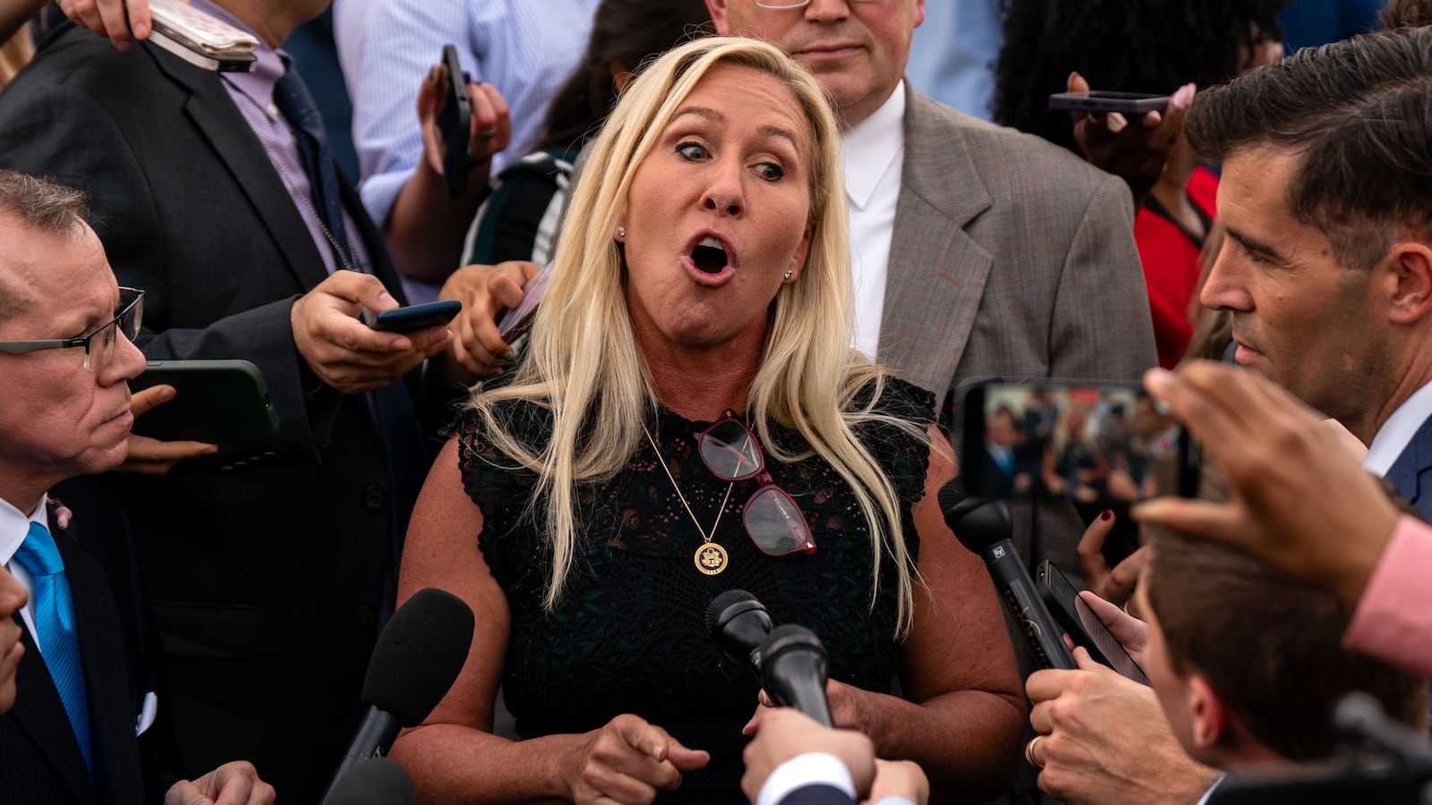 Rep. Marjorie Taylor Greene came to the defense of Dr. Michael Kirk Moore, who is accused of running a Covid vaccine scheme.