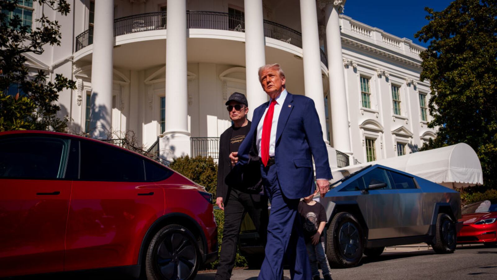 President Donald Trump and White House Senior Advisor, Tesla and SpaceX CEO Elon Musk depart after looking at Tesla vehicles on the South Lawn of the White House on March 11, 2025 in Washington, DC.