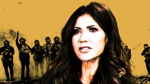 Kristi Noem in front of ICE officers throwing something toward protestors in Minneapolis, Minnesota