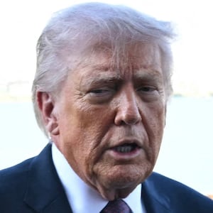 Secretary of Energy Chris Wright and President Donald Trump depart after a briefing on energy at the Port of Corpus Christi in Corpus Christi, Texas on February 27, 2026.