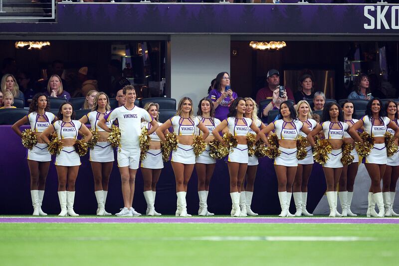 MINNEAPOLIS, MINNESOTA - AUGUST 16: Minnesota Vikings cheerleader Louie Conn lines up with cheerleaders in the first quarter during the NFL Preseason 2025 game between New England Patriots and Minnesota Vikings at U.S. Bank Stadium on August 16, 2025 in Minneapolis, Minnesota. (Photo by David Berding/Getty Images)