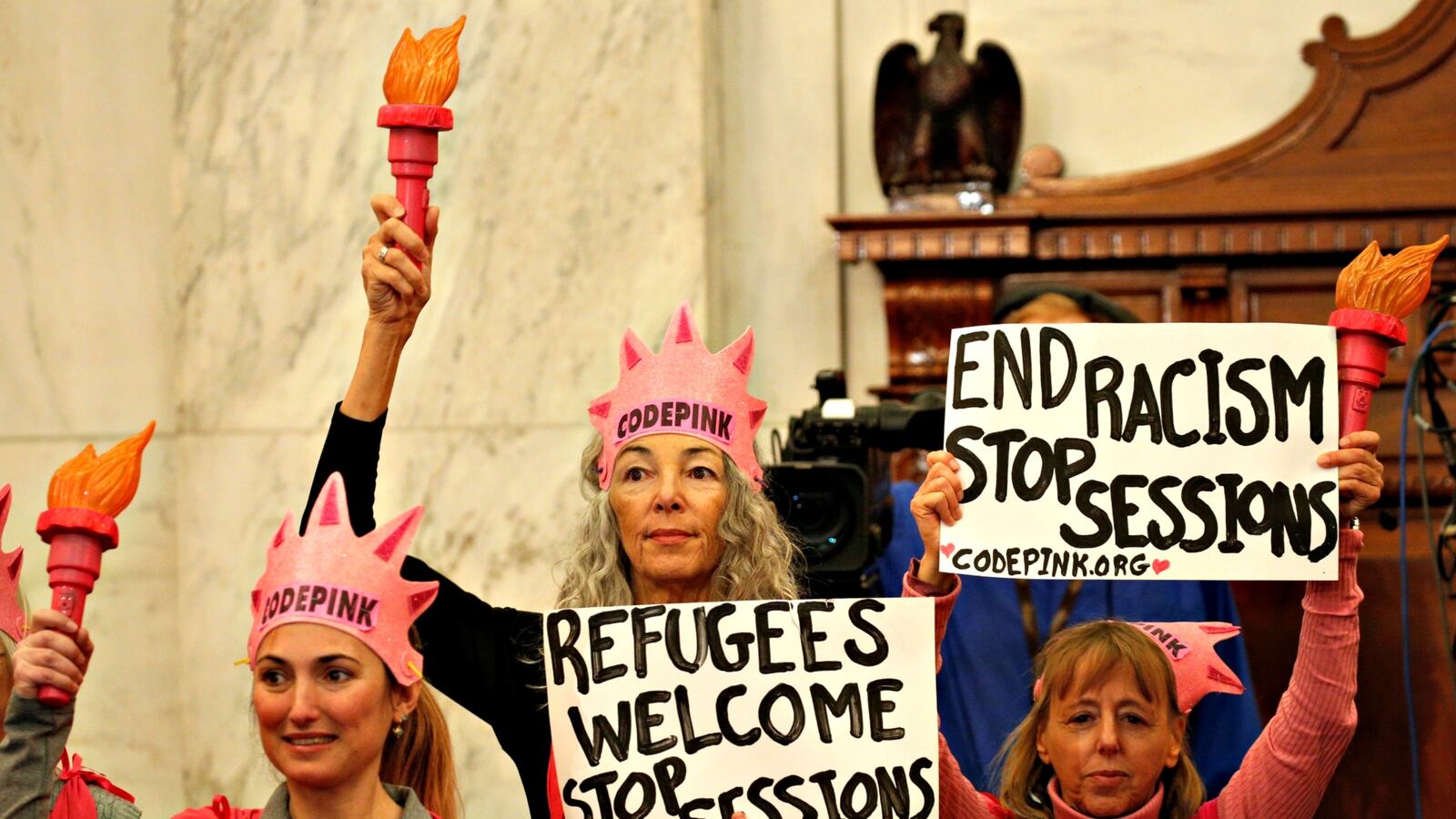 cheats/2017/05/03/jury-convicts-woman-for-laughing-during-sessions-hearing/170503-code-pink-convicted-cheat_w2gebd