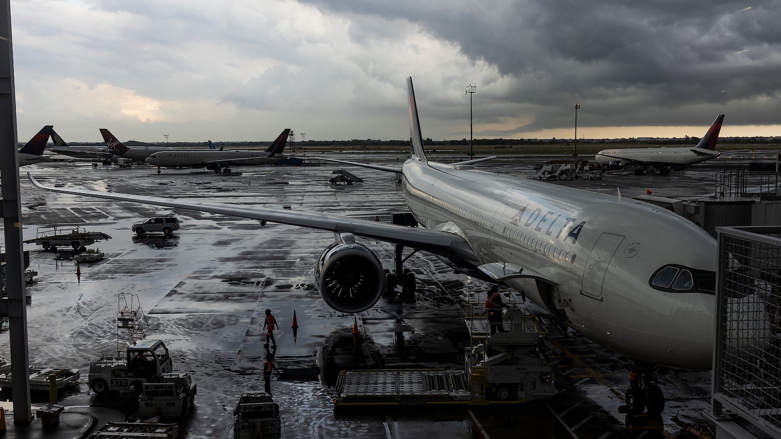 A summer storm passes over the Delate Airlines terminal at John F. Kennedy Airport on June 30, 2024, in the borough of Queens, New York City, New York.