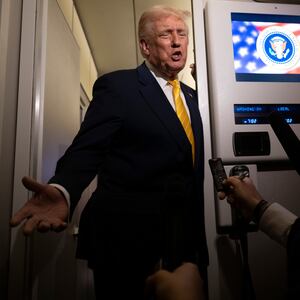 IN FLIGHT - NOVEMBER 14: U.S. President Donald Trump speaks to members of press aboard Air Force One on November 14, 2025 while in flight from Washington, DC to West Palm Beach International Airport. Trump is scheduled to spend the weekend at his Mar-A-Lago estate in Palm Beach, Florida. (Photo by Roberto Schmidt/Getty Images)