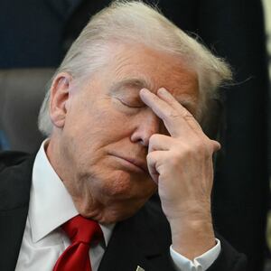 President Donald Trump gestures in the Oval Office of the White House in Washington, DC on November 6, 2025.