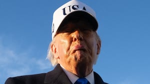 US President Donald Trump speaks to reporters before boarding Air Force One as he departs Joint Base Andrews in Maryland on March 13, 2026. President Trump is heading to Florida to spend the weekend at his Mar-a-Lago resort. (Photo by SAUL LOEB / AFP via Getty Images)