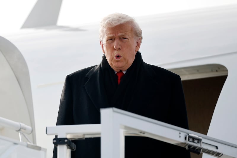 ZURICH, SWITZERLAND - JANUARY 21: U.S. President Donald Trump disembarks Air Force One as he arrives at Zurich Airport before attending the World Economic Forum (WEF) in Davos, on January 21, 2026 in Zurich, Switzerland. The annual meeting of political and business leaders comes amid rising tensions between the United States and Europe over a range of issues, including Trump's vow to acquire Greenland, a semi-autonomous Danish territory. (Photo by Chip Somodevilla/Getty Images)