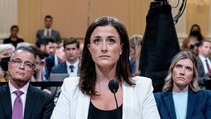 Cassidy Hutchinson, who was an aide to former White House Chief of Staff Mark Meadows during the administration of former U.S. President Donald Trump, watches a video play on a large display, during a public hearing of the U.S. House Select Committee investigating the January 6 Attack on the U.S. Capitol, at the Capitol, in Washington, U.S., June 28, 2022.