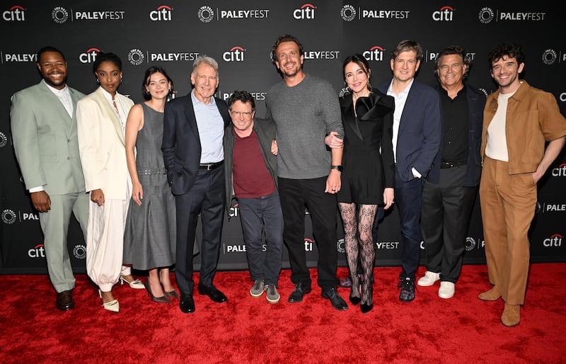 (L-R) Luke Tennie, Jessica Williams, Lukita Maxwell, Harrison Ford, Michael J. Fox, co-creator/executive producer Jason Segel, Christa Miller, co-creator/showrunner/executive producer Bill Lawrence, Ted McGinley, and Michael Urie attend Apple TV's "Shrinking" Season 3 Finale Screening at PaleyFest LA at Dolby Theatre on April 07, 2026 in Hollywood, California