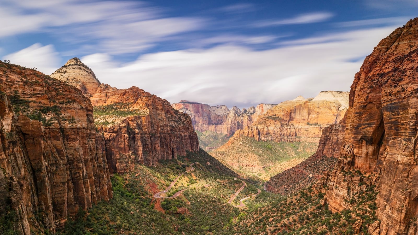 a long exposure to capture a beautiful view from Pine Creek Canyon Overlook during a summer sunny day, Utah, United States of America