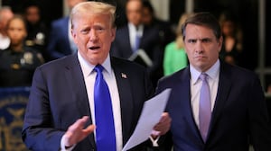 Former U.S. President Donald Trump, alongside his attorney Todd Blanche, speaks to the media as he arrives for his criminal trial for allegedly covering up hush money payments at Manhattan Criminal Court on May 30, 2024 in New York City. Judge Juan Merchan gave the jury their instructions, and deliberations are entering their second day. The former president faces 34 felony counts of falsifying business records in the first of his criminal cases to go to trial.