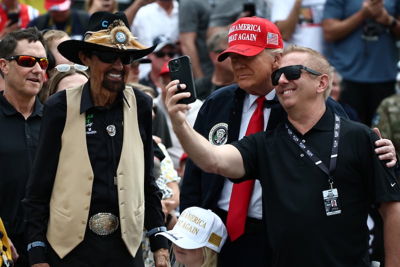 President Donald Trump takes a selfie with Greg Biffle at this year’s Daytona 500. The former racer posted on X that he also met former presidents Barack Obama and George W. Bush.