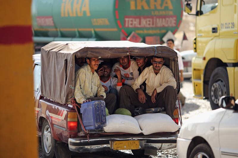 galleries/2014/06/16/thousands-flee-violence-in-iraq-photos/140616-iraq-refugees-12_wyny0p