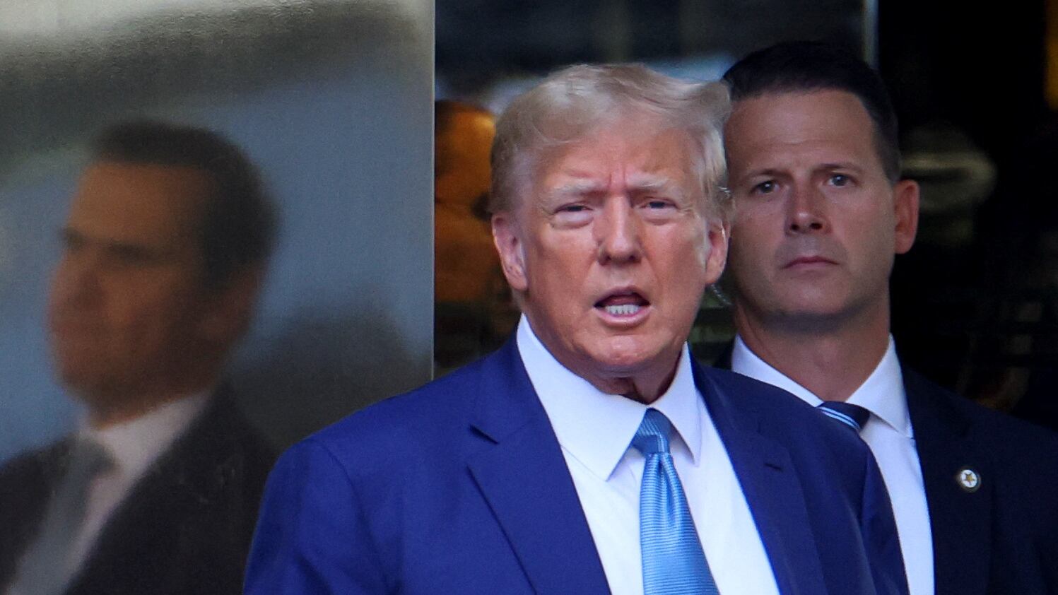 Donald Trump exits Trump Tower.