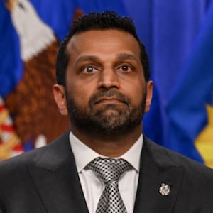 Acting U.S. Attorney General Todd Blanche speaks as Federal Bureau of Investigation (FBI) Director Kash Patel stands by his side during a press conference at the Department of Justice in Washington, D.C., U.S., April 21, 2026.