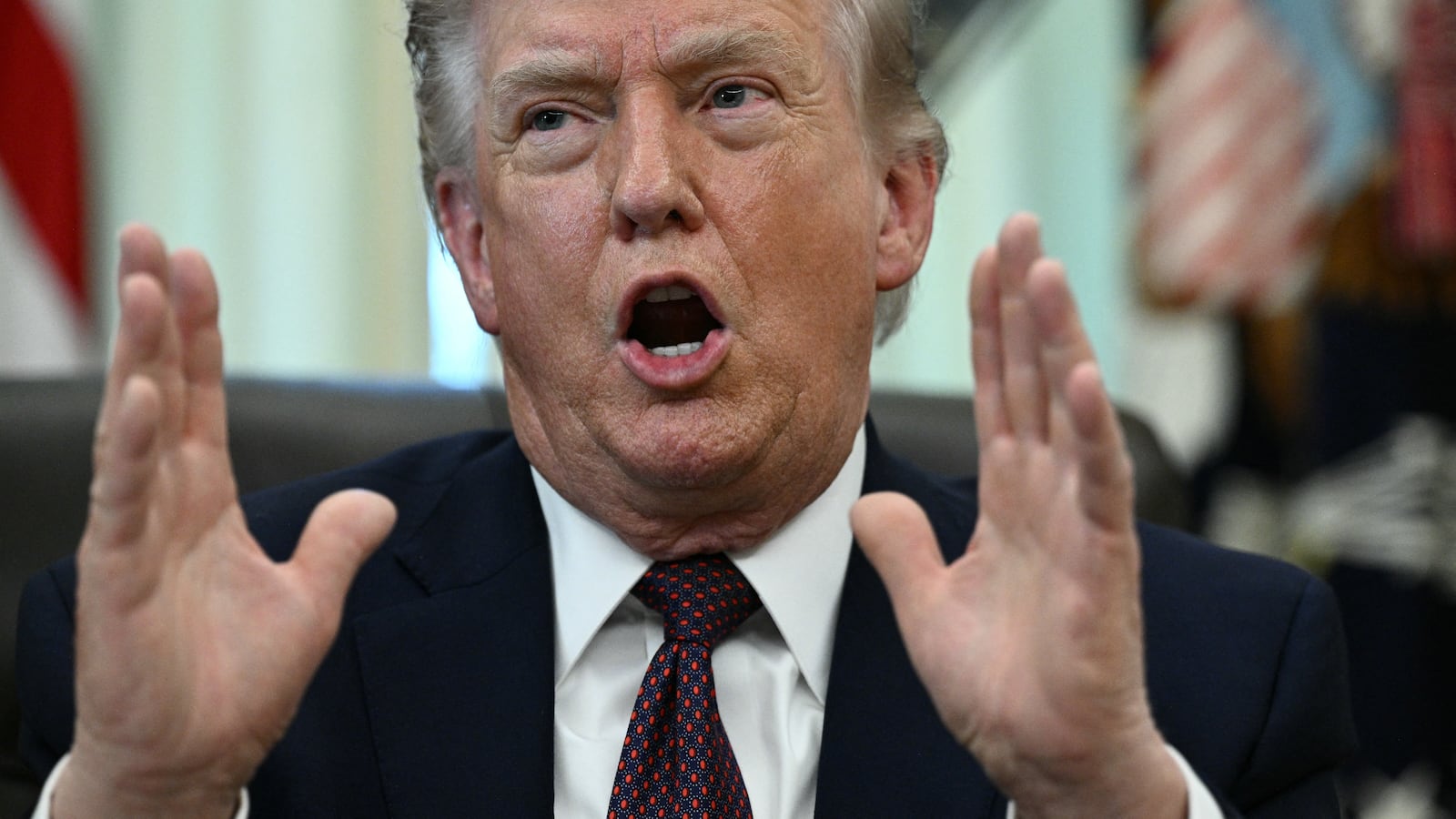 US President Donald Trump speaks after signing an executive order in the Oval Office of the White House in Washington, DC, on March 31, 2026.