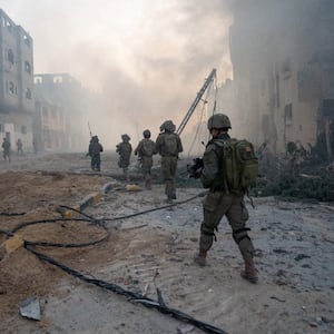 Israeli soldiers operate in the Gaza Strip amid the ongoing conflict between Israel and the Palestinian Islamist group Hamas