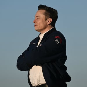 TOPSHOT - Elon Musk steps off Air Force One upon arrival at Morristown Municipal Airport in Morristown, New Jersey, on March 22, 2025. US President Donald Trump will be spending the weekend at Trump National Golf Club in Bedminster, New Jersey. (Photo by Brendan SMIALOWSKI / AFP) (Photo by BRENDAN SMIALOWSKI/AFP via Getty Images)