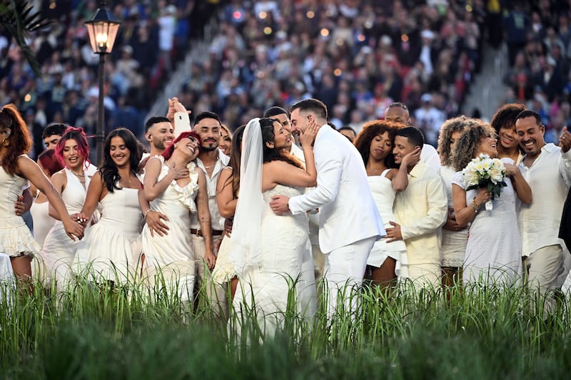Performers portray a wedding during Puerto Rican singer Bad Bunny performance at Super Bowl LX Patriots vs Seahawks Apple Music Halftime Show at Levi's Stadium in Santa Clara, California on February 8, 2026.