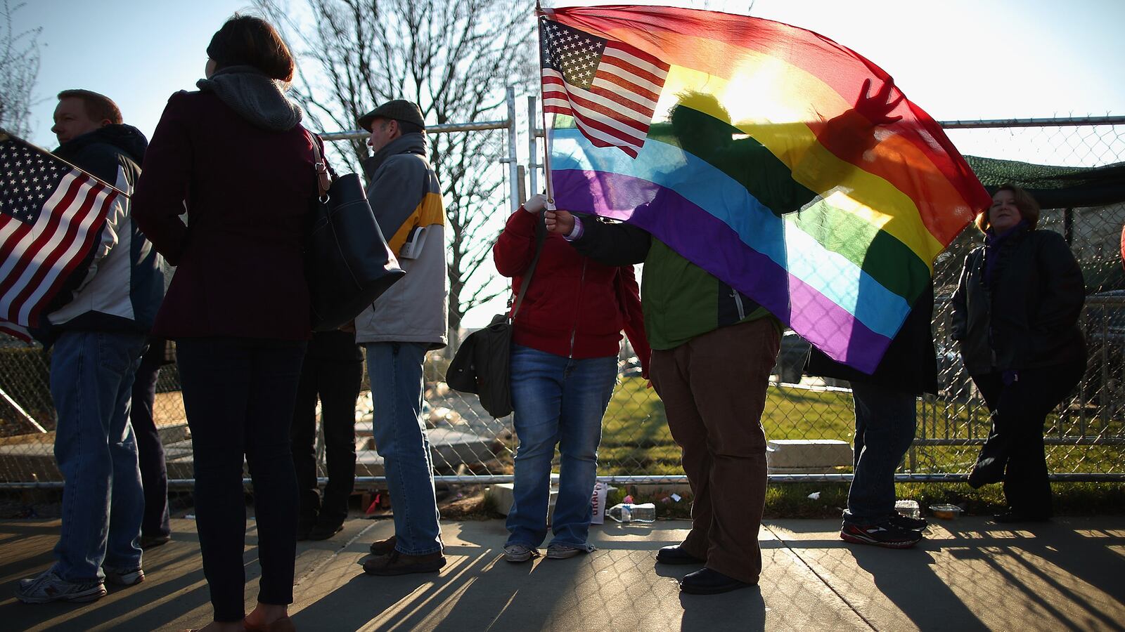 galleries/2013/03/26/scotus-marriage-equality-rallies/130327-marriage-equailty-flag-fence_fbhecg