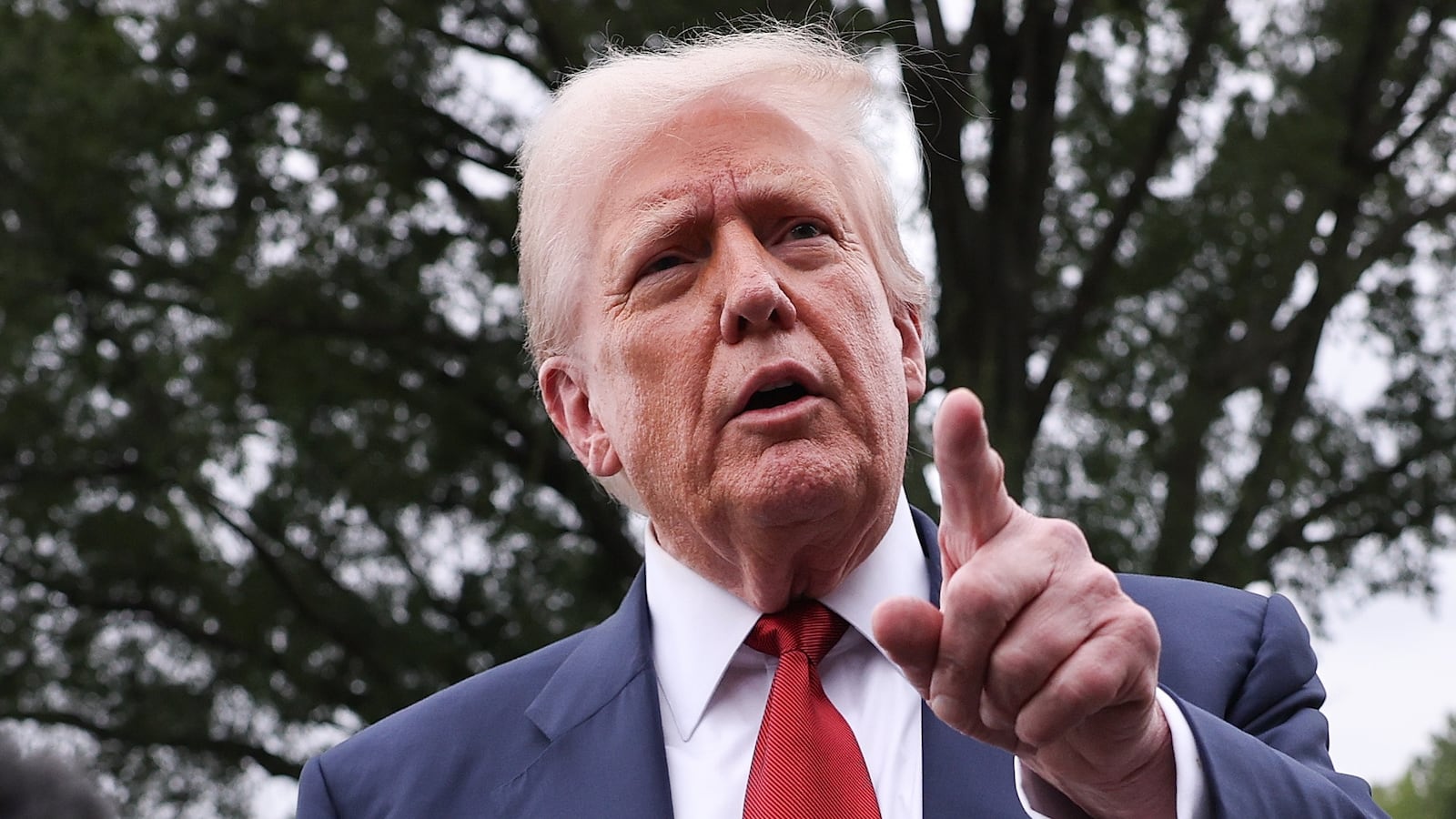 President Donald Trump speaks to the media as he departs the White House on August 01, 2025 in Washington, DC.