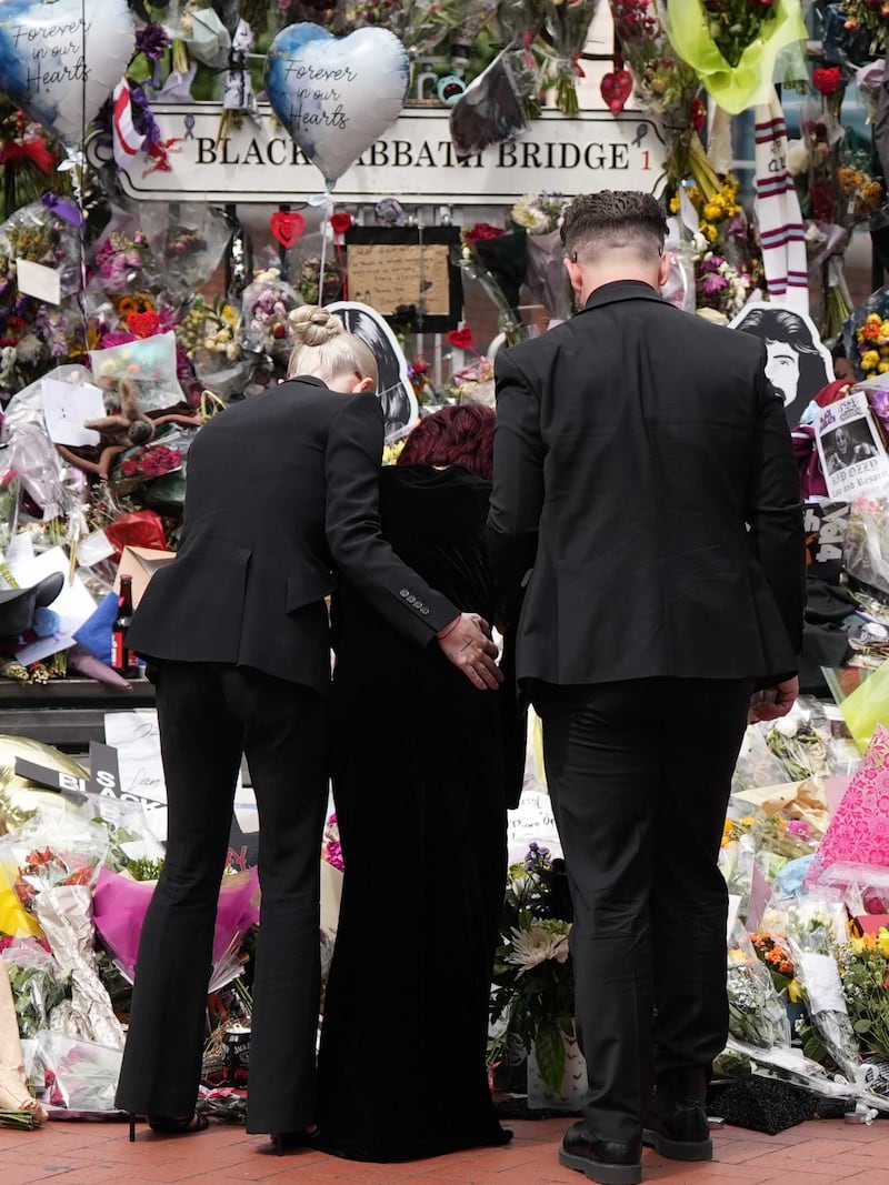 BIRMINGHAM, UNITED KINGDOM - JULY 30: Flowers and notes are seen on the Black Sabbath Bridge in Birmingham, United Kingdom on July 30, 2025, placed ahead of the funeral procession of Ozzy Osbourne, the legendary British heavy metal musician and frontman of Black Sabbath, who passed away at the age of 76. (Photo by Ioannis Alexopoulos/Anadolu via Getty Images)