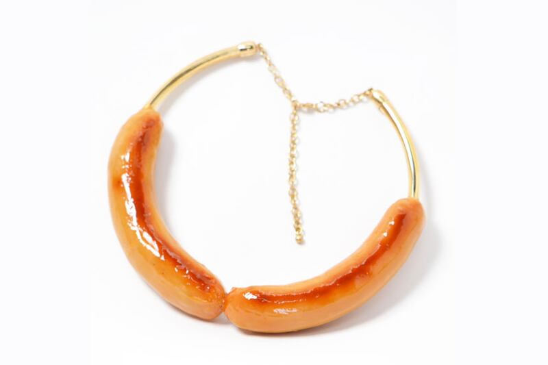 galleries/2013/04/01/japanese-company-fake-food-hatanaka-makes-food-jewelry-and-headbands/130328-hatanaka-sausage_n3bniv