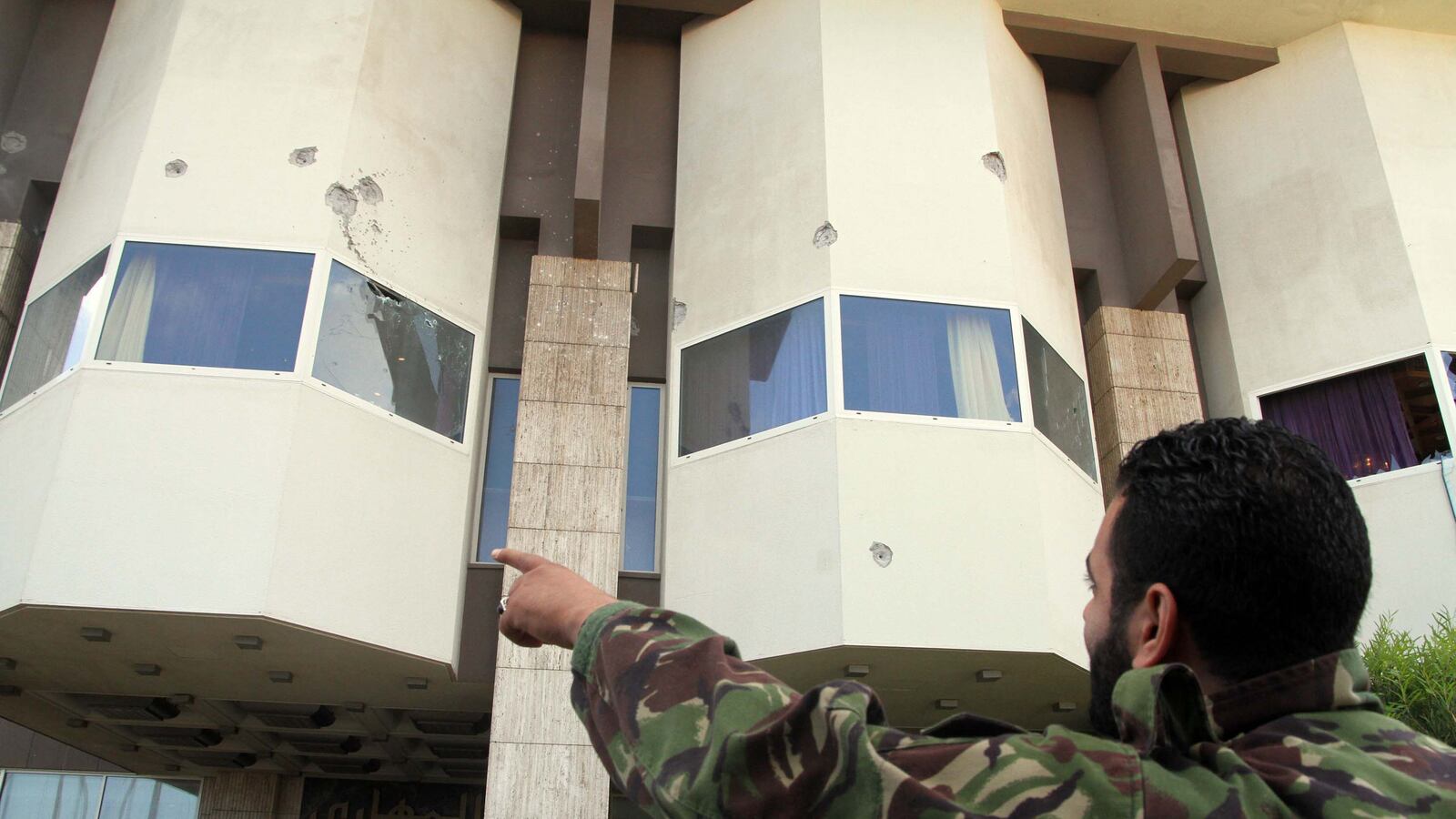 articles/2013/11/08/libya-on-the-brink-as-militia-fighting-engulfs-tripoli/131107-dettmer-libya-tease_ebgb9d