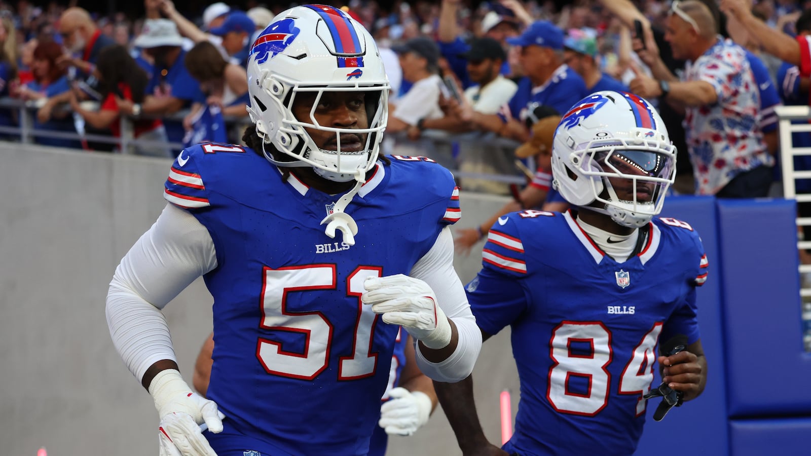 The Buffalo Bills run onto the field at the new Highmark Stadium.