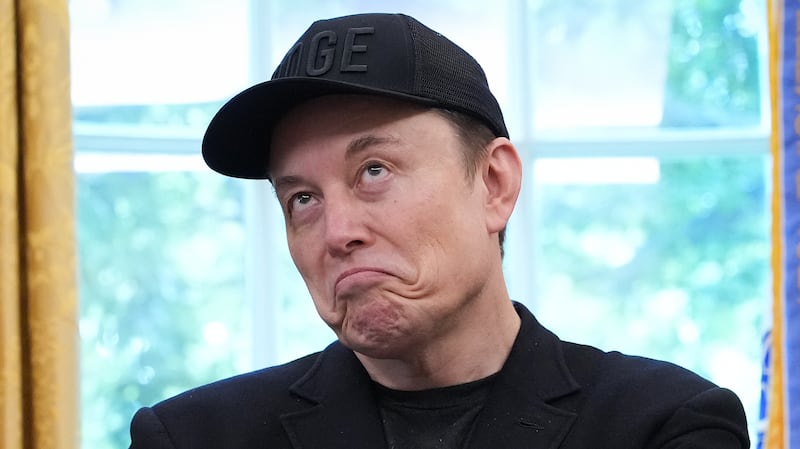Tesla CEO Elon Musk speaks alongside U.S. President Donald Trump to reporters in the Oval Office of the White House on May 30, 2025 in Washington, DC. Musk, who served as an adviser to Trump and led the Department of Government Efficiency, announced he would leave his role in the Trump administration to refocus on his businesses.