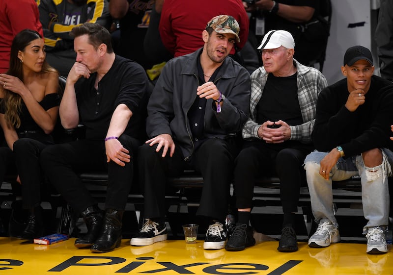 LOS ANGELES, CALIFORNIA - MAY 12: Elon Musk (2L) and David Geffen (2R) attend the Western Conference Semifinal Playoff game between the Los Angeles Lakers and Golden State Warriors at Crypto.com Arena on May 12, 2023 in Los Angeles, California. (Photo by Kevork Djansezian/Getty Images)