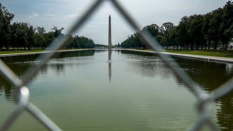 The Reflecting Pool which is encircled by fencing in Washington, D.C., U.S., July 10, 2026.  REUTERS/Evelyn Hockstein