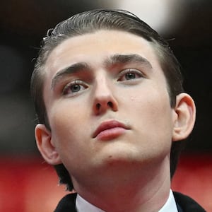 US President Donald Trump' son Barron Trump looks on during the inaugural parade inside Capital One Arena, in Washington, DC, on January 20, 2025. (Photo by Jim WATSON / AFP)