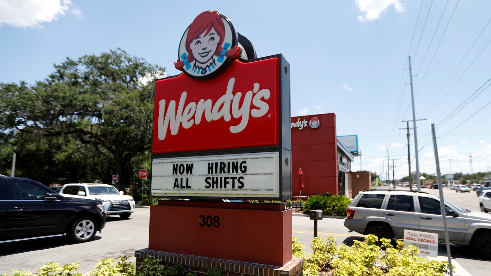 A Wendy’s restaurant displays a “Now Hiring” sign in Tampa, Florida, June 1, 2021.