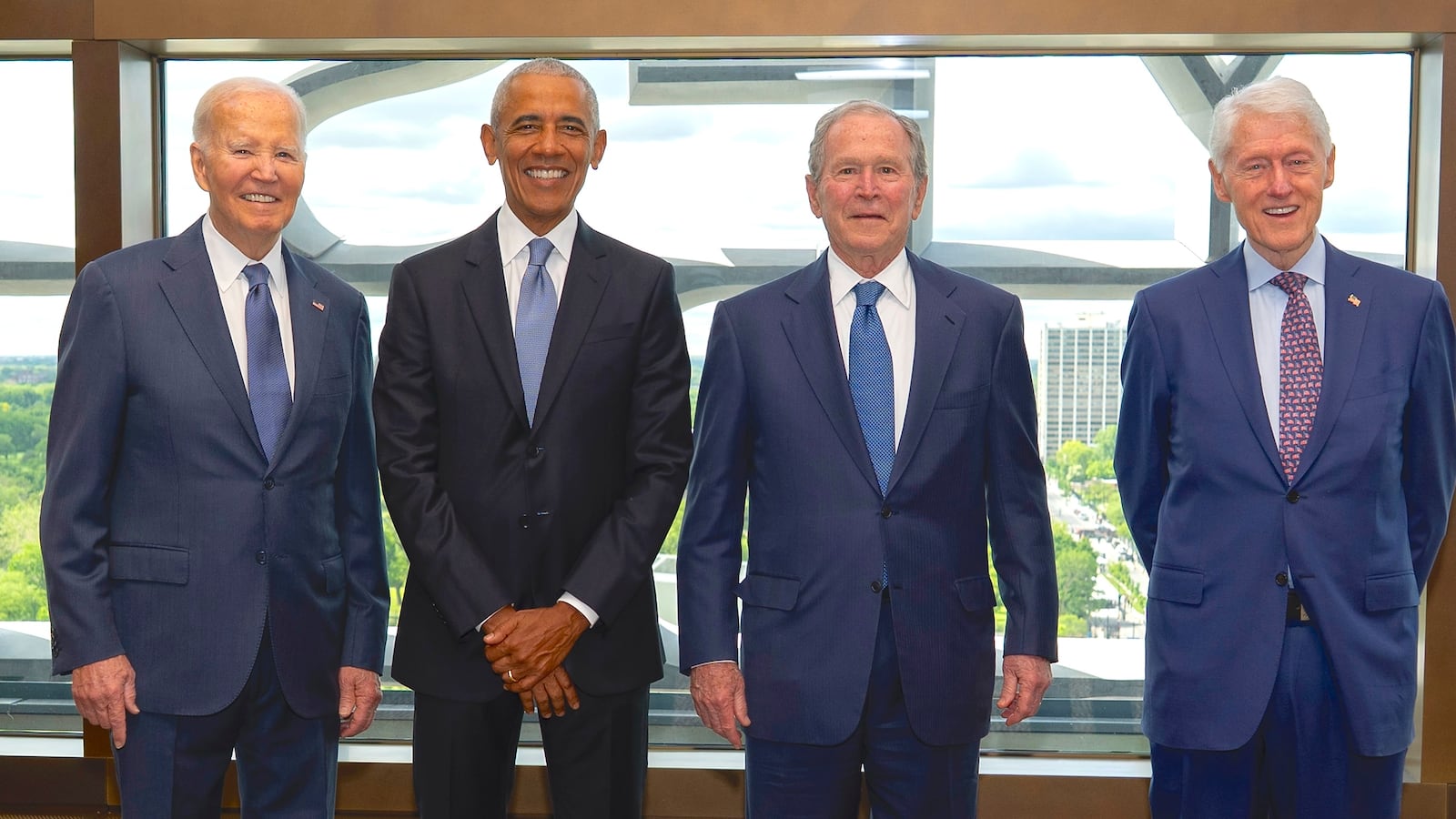 Former President Joe Biden, from left, former President Barack Obama, former President George W. Bush, and former President Bill Clinton, pose for a photo ahead of the dedication ceremony at the Obama Presidential Center, Thursday, June 17, 2026, in Chicago.