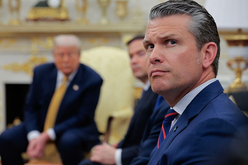 Secretary of Defense Pete Hegseth attends a meeting with President Donald Trump and Philippine President Ferdinand Marcos Jr. in the Oval Office at the White House on July 22, 2025 in Washington, DC. Trump and Marcos are expected to discuss trade tariffs, increasing security cooperation in the face of China’s growing maritime power in the West Philippine Sea and other topics. Hegseth was joined by Secretary of State Marco Rubio and Treasury Secretary Scott Bessent.