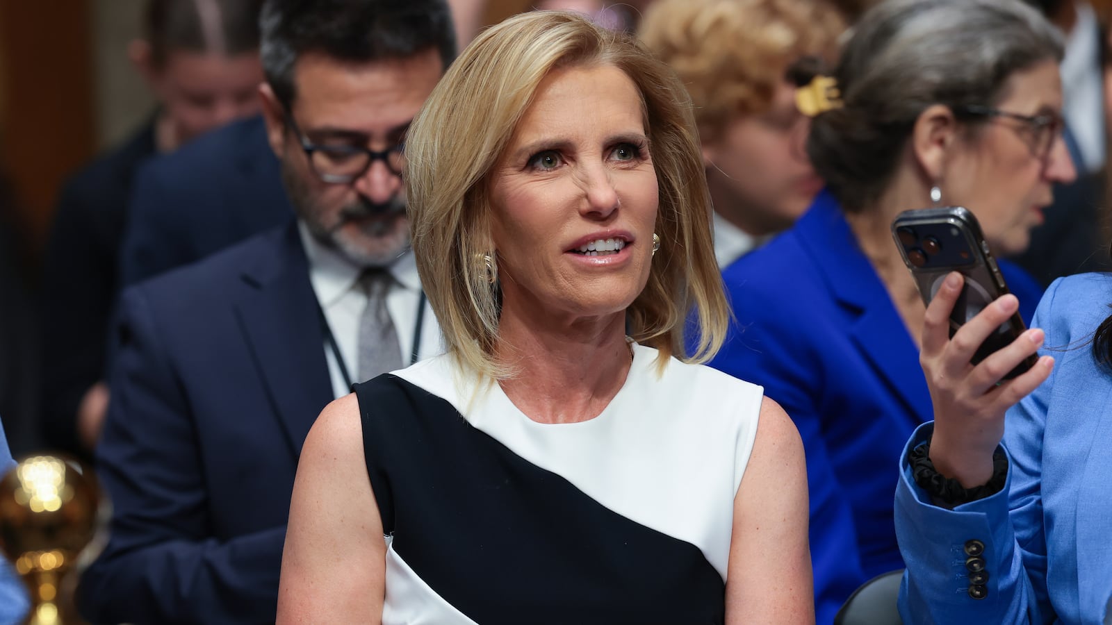 WASHINGTON, DC - JULY 29: Fox News host Laura Ingraham watches from the audience as former NIH Director Anthony Fauci testifies before the Senate Homeland Security and Governmental Affairs Committee hearing on July 29, 2026 in Washington, DC. Fauci was expected to be questioned about his diary entries during his handling of the Covid-19 pandemic. (Photo by Anna Moneymaker/Getty Images)