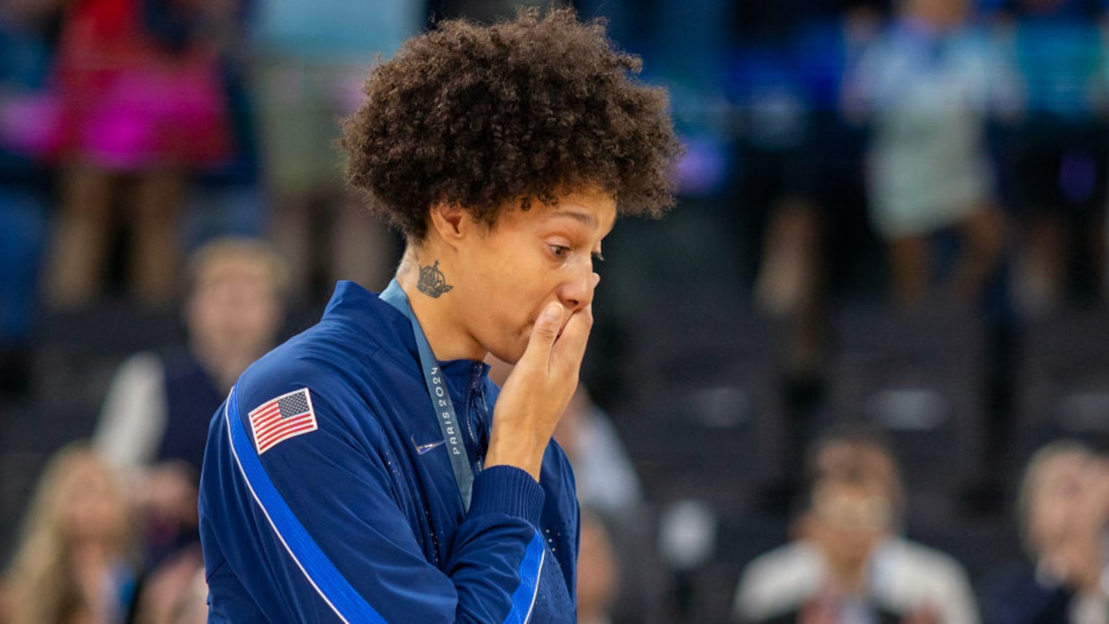 Team USA’s Brittney Griner wipes away the tears while during the team's gold medal ceremony.