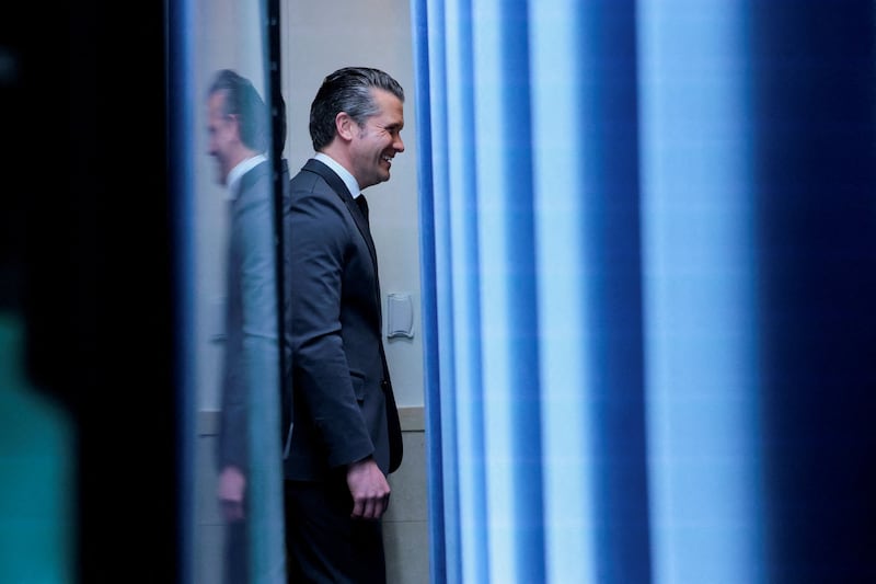 U.S. Secretary of Defense Pete Hegseth reacts after walking out of a press briefing by U.S. President Donald Trump at the White House, following a shooting incident during the annual White House Correspondents’ Association dinner, in Washington, D.C., U.S., April 25, 2026