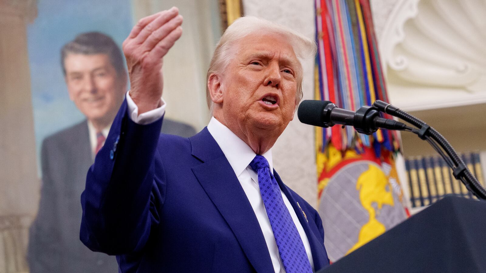U.S. President Donald Trump speaks after Tulsi Gabbard is sworn in as director of national intelligence in the Oval Office at the White House on February 12, 2025 in Washington, DC.