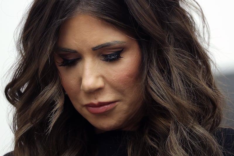 WASHINGTON, DC - JANUARY 15: U.S. Secretary of Homeland Security Kristi Noem bows her head during the benediction at the Assumption of Command Ceremony for U.S. Coast Guard Commandant Adm. Kevin E. Lunday at the U.S. Coast Guard Headquarters on January 15, 2026 in Washington, DC. Lunday will was sworn in as the 28th Commandant of the United States Coast Guard, replacing outgoing Commandant Admiral Linda Fagan. (Photo by Kevin Dietsch/Getty Images)