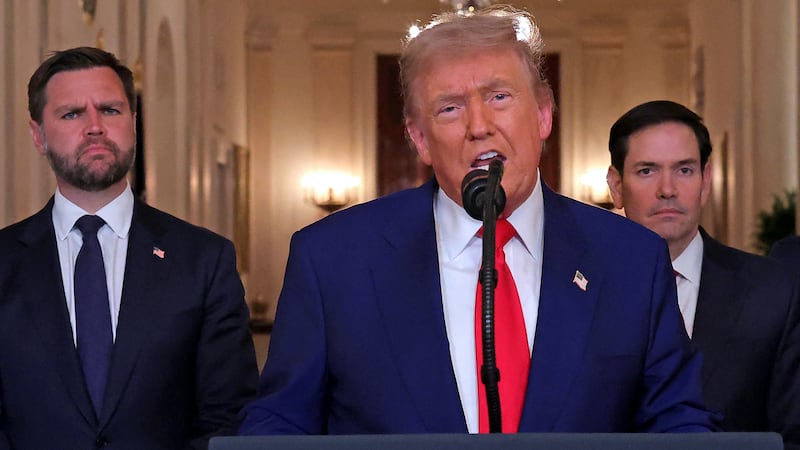 US President Donald Trump alongside US Vice President JD Vance (L) and US Secretary of State Marco Rubio.