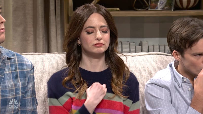 Sarah Sherman making the sign of the cross, SNL