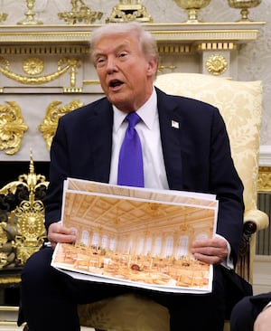 WASHINGTON, DC - OCTOBER 22: U.S. President Donald Trump displays a rendering of his proposed $250 million White House ballroom as he meets with NATO Secretary General Mark Rutte (L) in the Oval Office of the White House on October 22, 2025 in Washington, DC. Less than a week after hosting Ukrainian President Volodymyr Zelensky, Trump is meeting with Rutte to discuss the war in Ukraine. (Photo by Alex Wong/Getty Images)
