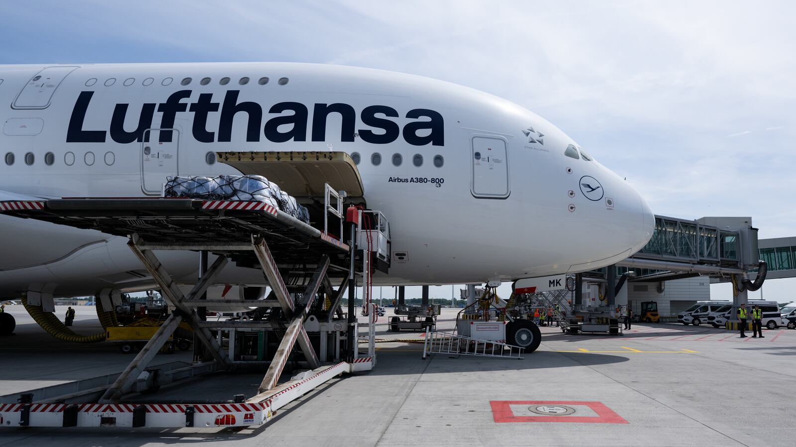 A Lufthansa Airbus A380 aircraft sits at its gate in Boston.