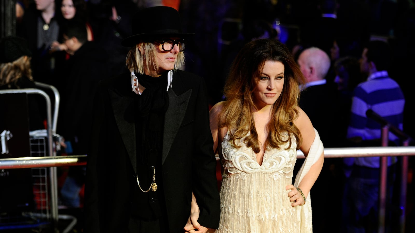 Michael Lockwood (left) and Lisa Marie Presley (right) arrive at a movie premiere in 2010.