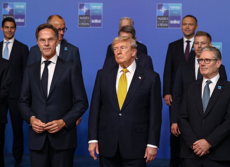 U.S. President Donald Trump stands next to NATO Secretary General Mark Rutte and British Prime Minister Keir Starmer as NATO leaders gather for a family photo at a NATO leaders' summit in Ankara, Turkey, July 8, 2026. REUTERS/Stoyan Nenov