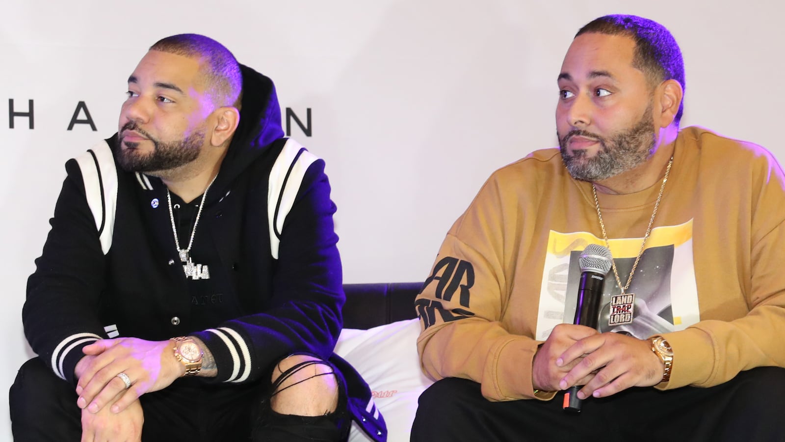 A photo of DJ Envy and Cesar Piña.