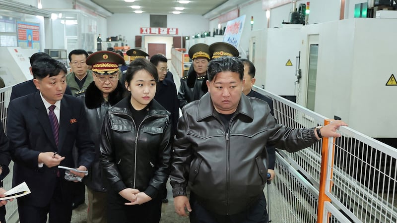 North Korean leader Kim Jong Un, accompanied by his daughter Kim Ju Ae, visits a munitions factory in Pyongyang, North Korea, in this picture released on March 12, 2026 by North Korea's official Korean Central News Agency.